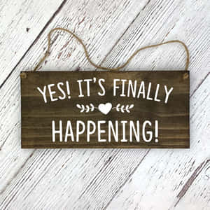 Finally Happening Wooden Sign Wallpaper