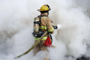 Fire Department Officer On A Thick White Smoke Wallpaper