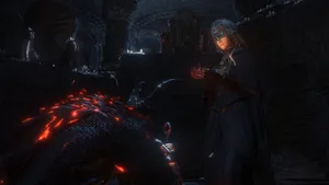 Fire Keeper Gazing Into The Flames Wallpaper