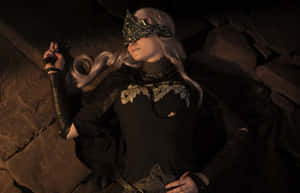 Fire Keeper Warming Up By A Bonfire Wallpaper