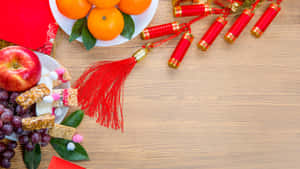 Firecrackers And Festive Fruits Wallpaper