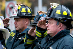 Firefighters Saluting Duty Honor First Responders Day Wallpaper