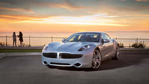 Fisker Electric Vehicle On A Scenic Road Wallpaper