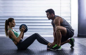 Fitness Training With A Personal Trainer Wallpaper