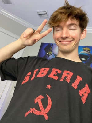 Flamingo Albert Making A Splash In Its Natural Habitat Wallpaper