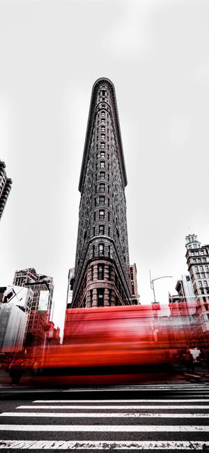 Flatiron Building Red Passing Vehicle Wallpaper