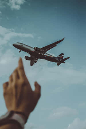 Flight With A Hand Wallpaper