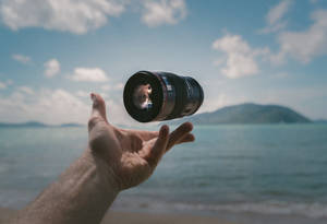 Floating Camera Lens Wallpaper