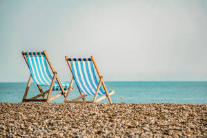 Florida Beach And Two Sun Chairs Wallpaper