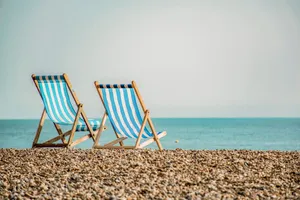Florida Beach And Two Sun Chairs Wallpaper