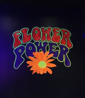 Flower Power - A Neon Sign With A Flower Wallpaper