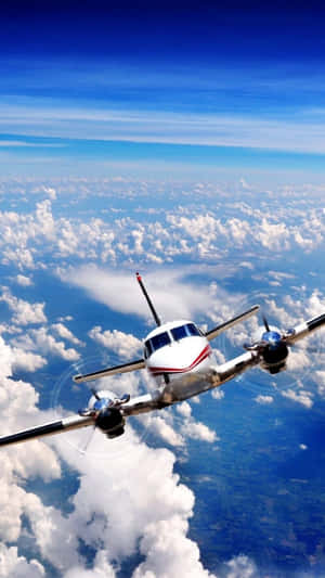 Fly Above The Clouds With An Iphone Wallpaper