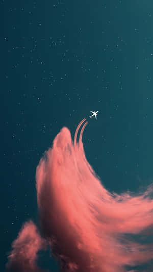 Fly Above The Clouds With The Amazing Pink Plane Wallpaper