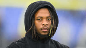 Focused Athlete Outdoor Portrait Wallpaper