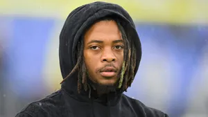 Focused Athlete Outdoor Portrait Wallpaper