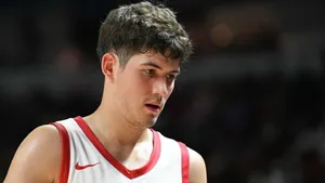 Focused Basketball Player Portrait Wallpaper