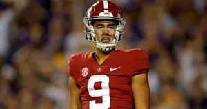 Focused Football Player Bryce Young Wallpaper