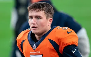 Focused Football Player Drew Lock Wallpaper