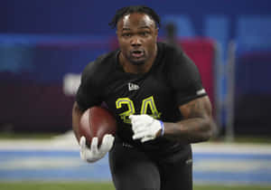 Focused Football Player During Drill.jpg Wallpaper