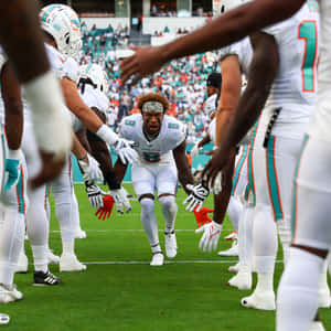 Focused Football Player Entrance Wallpaper