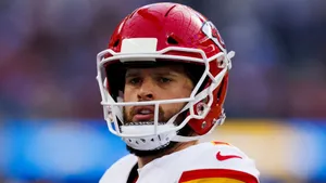 Focused Football Player Helmet Wallpaper