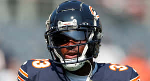 Focused Football Player Helmet Visor Wallpaper