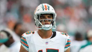 Focused Football Player Jaelan Phillips Wallpaper