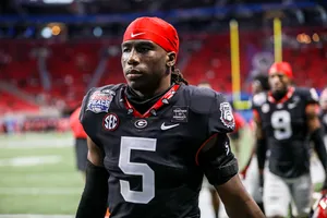 Focused Football Player Kelee Ringo Wallpaper