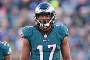 Focused Football Player Nakobe Dean17 Wallpaper