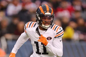 Focused Football Player Number11 Wallpaper