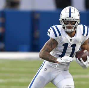 Focused Football Player Number11 Wallpaper