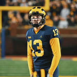 Focused Football Player Number13 Wallpaper