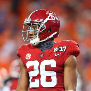 Focused Football Player Number26 Wallpaper