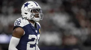 Focused Football Player Number26 Wallpaper