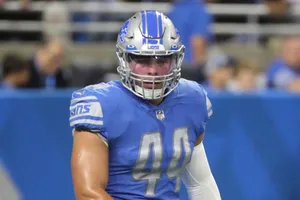 Focused Football Player Number49 Wallpaper