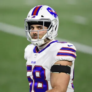 Focused Football Player Number58 Wallpaper