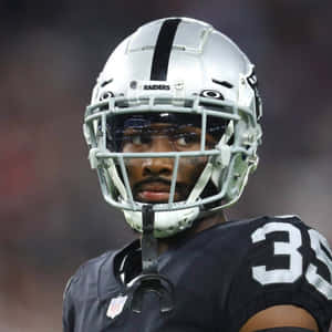 Focused Football Player Portrait Wallpaper