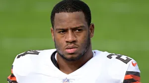 Focused Football Player Portrait Wallpaper