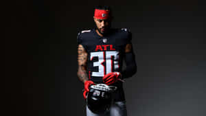 Focused Football Player Portrait Wallpaper