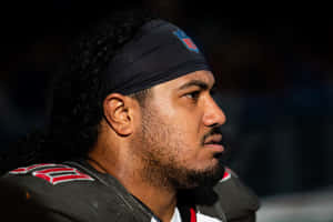 Focused Football Player Profile Wallpaper