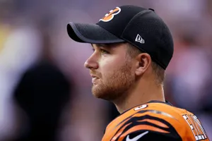 Focused Football Player Sideline Portrait Wallpaper