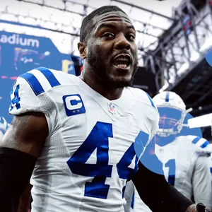 Focused Football Player Wearing Number44 Wallpaper