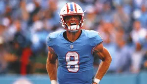 Focused Football Quarterback Number8 Wallpaper