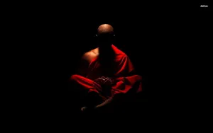 Focused Professional In A Modern Office Wallpaper