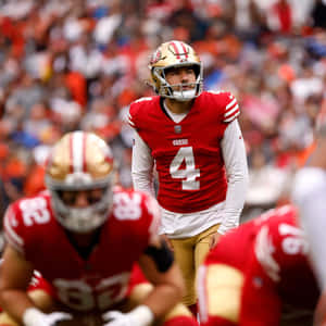 Focused Quarterback Preparation Wallpaper