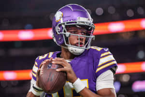 Focused Quarterback Preparation Wallpaper