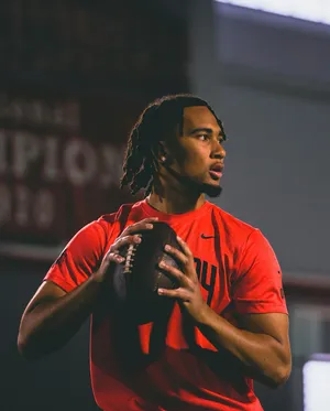 Focused Quarterback Preparation Wallpaper