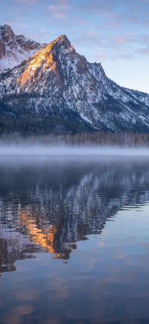 Foggy Lake Before The Mountains Of Idaho Wallpaper