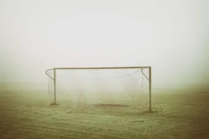 Foggy Soccer Goal Field Wallpaper