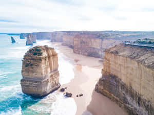 Foggy Twelve Apostles In Victoria Australia Wallpaper